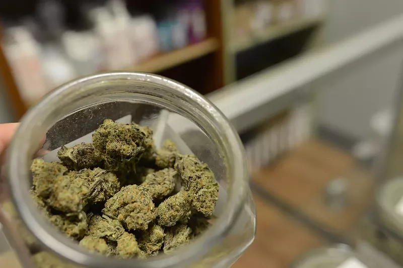 Image: Open jar of cannabis buds