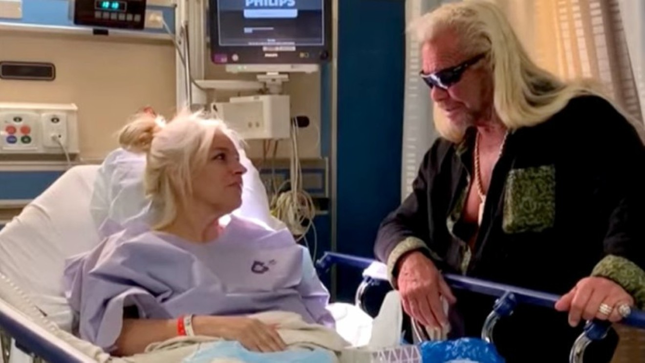A hospitalized Beth Chapman and husband Duane "Dog" Chapman in an image from a memorial video.