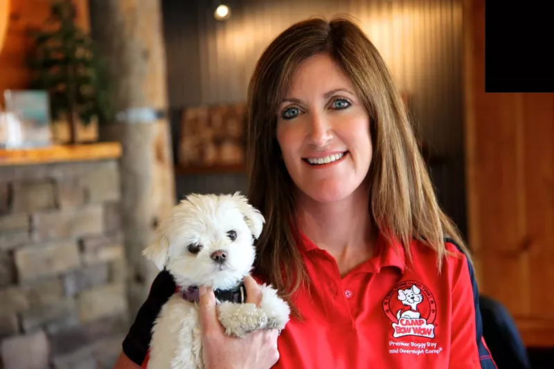 Image: As founder of Camp Bow Wow, Heidi Ganahl has plenty of fur-covered friends.