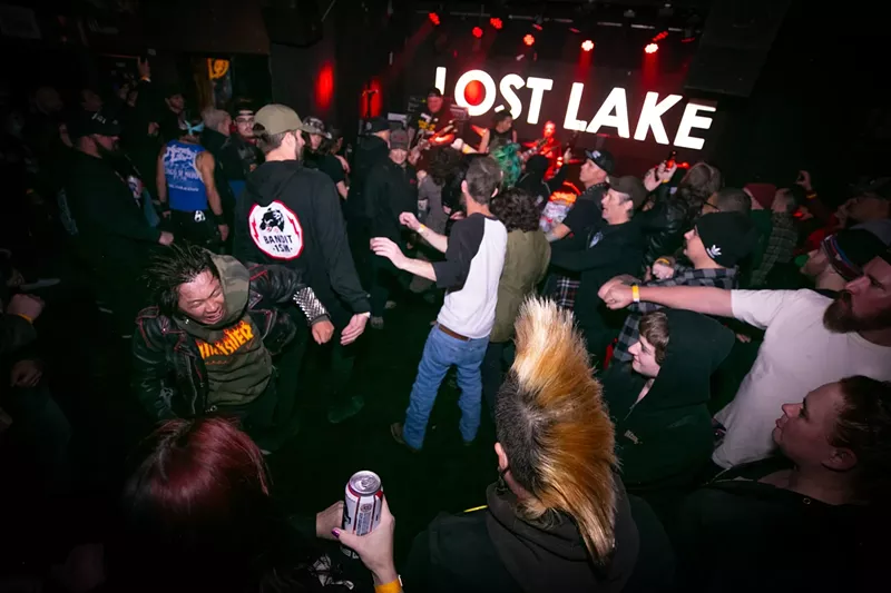 Image: A moshpit breaks out during a Cobranoid show at Lost Lake last year. See the guy in the white T-shirt on the right holding his arm out? That's how you stand at the edge of a pit while letting everyone know you don't want to participate.