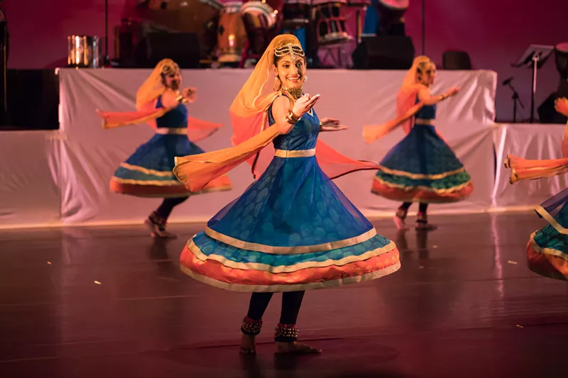 Image: Dancers perform onstage.