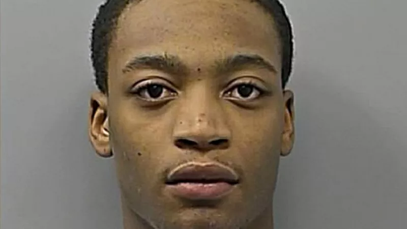 Image: A past booking photo of Donthe Lucas.