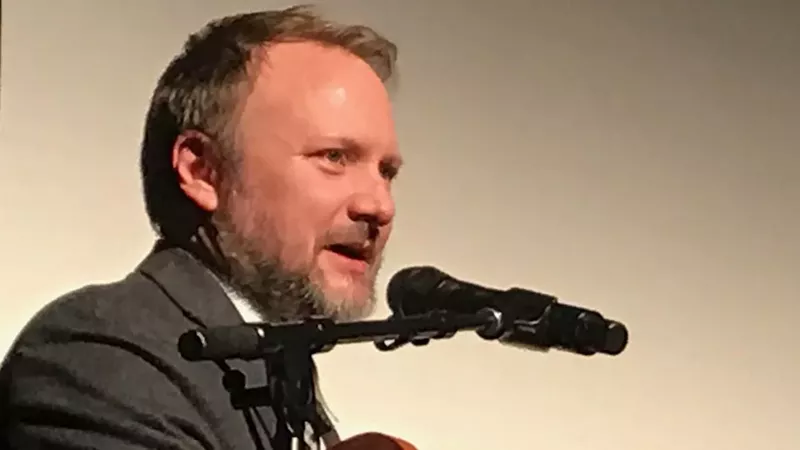 Image: Director Rian Johnson accepting the Denver Film Festival's John Cassavetes Award.