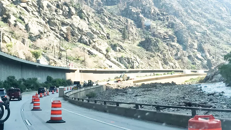 Image: A look at a lane closure and debris piles as seen from eastbound I-70 through Glenwood Canyon on September 6.
