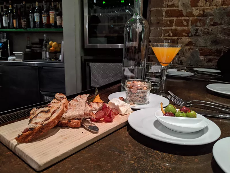 Image: Appetizers and a tasty mocktail during Duo's happy hour.