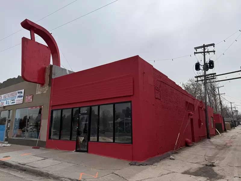 Image: a red building