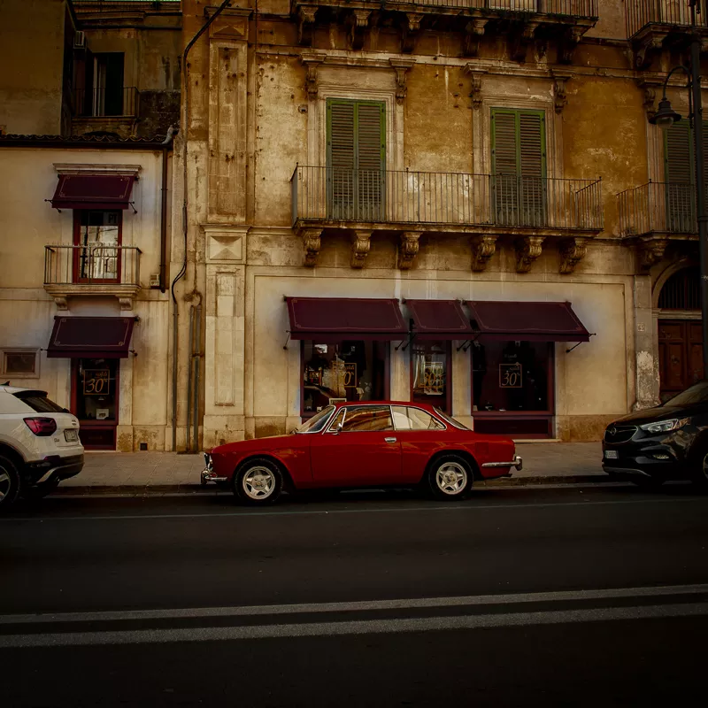 Image: A photo of a red car.