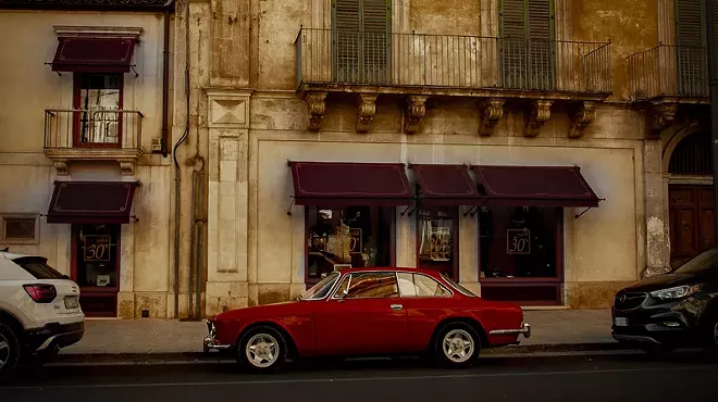 A photo of a red car.