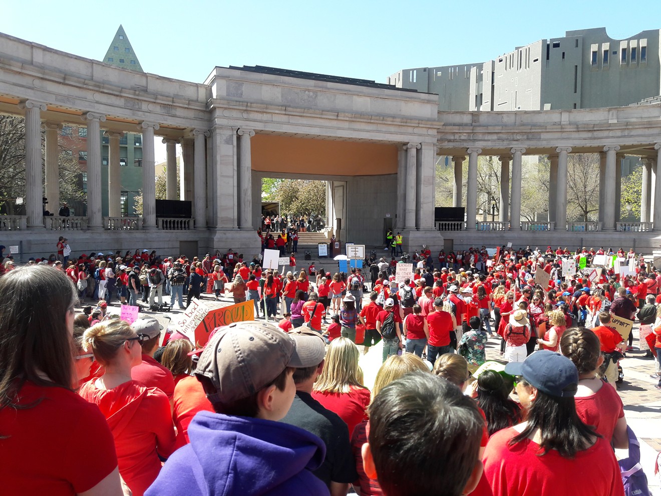 Colorado educators marched on the Capitol as part of the national #RedForEd rallies during the 2018 legislative session. Initiative 93 signature-gatherers were stationed in Civic Center Park during the rally.
