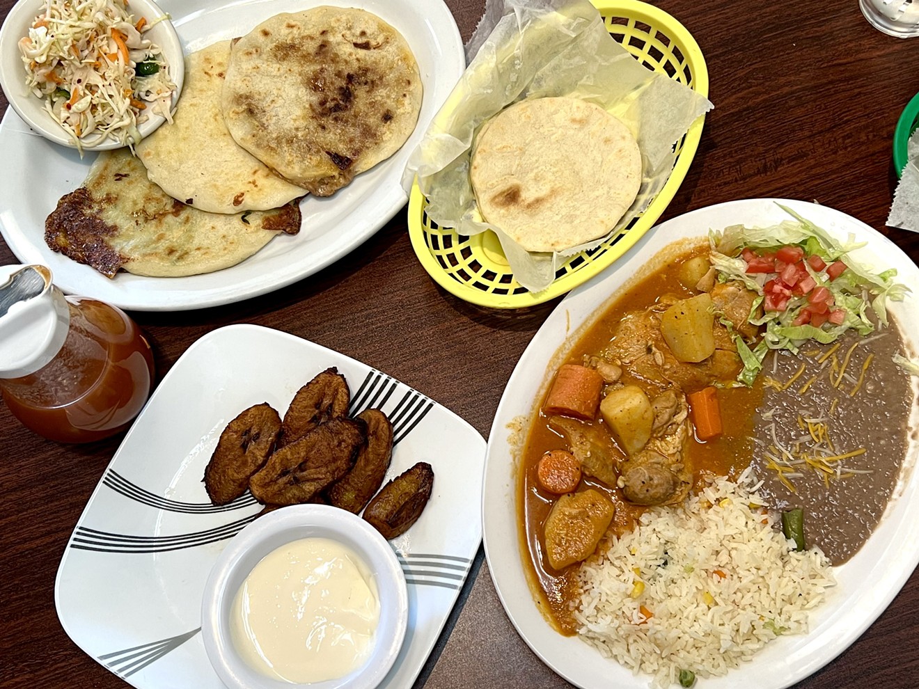 El Lucero's menu includes pupusas, plantains and pollo guisado.