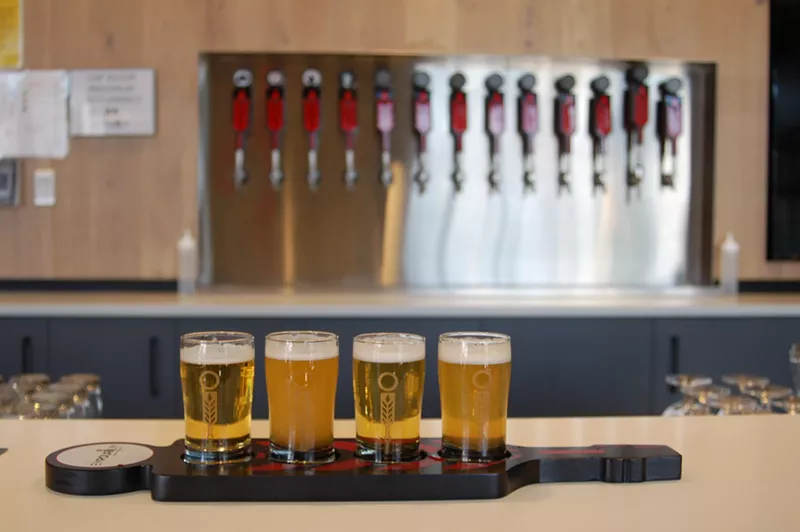 Image: Custom taster trays match the glassware and tap handles.