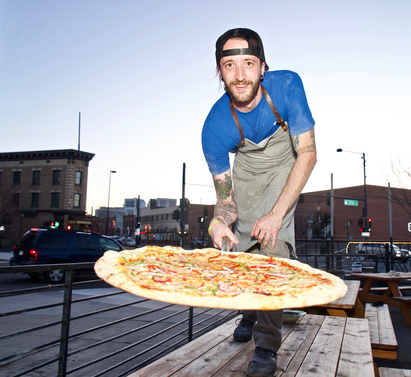Chef Mat Shumaker presents a New York-style pie at Famous Original J's.