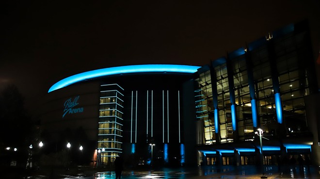 Ball Arena lit up at night in Denver
