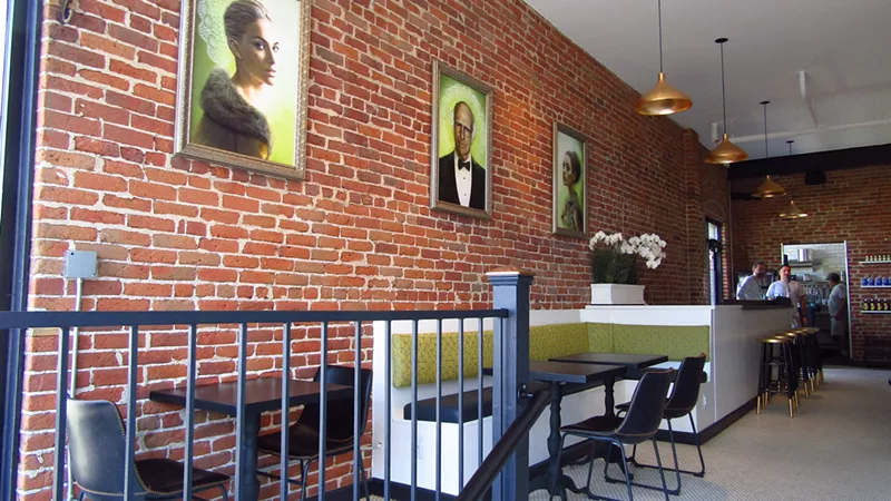 Image: Artist Bec Winnel created the portraits that hang inside Rye Society.