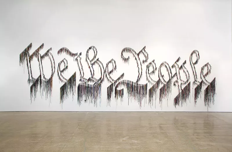Image: Nari Ward, “We the People,” 2011, colored shoelaces.