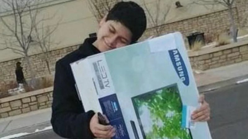 Image: Tayson Hildalgo accepted delivery of this new TV — but he didn't do a lot of delivering personally.