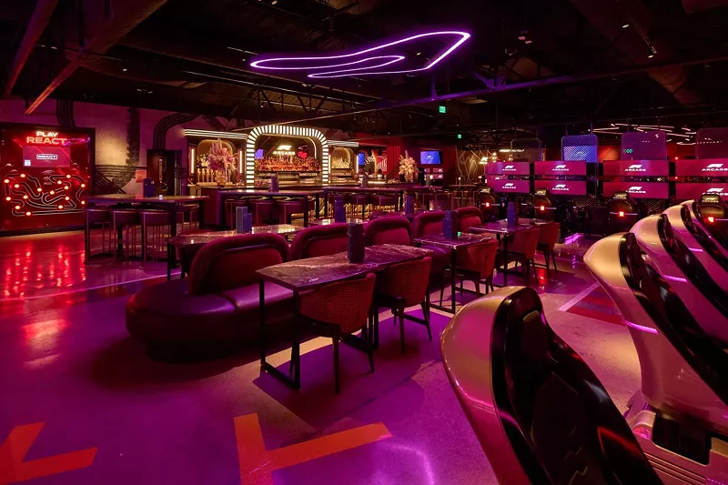 Image: intreior of a bar with racing simulators
