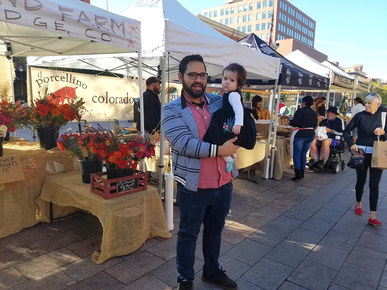Chef Franco Ruiz of Fruition and his one-year-old daughter, Luna, at the Union Station Farmers' Market.