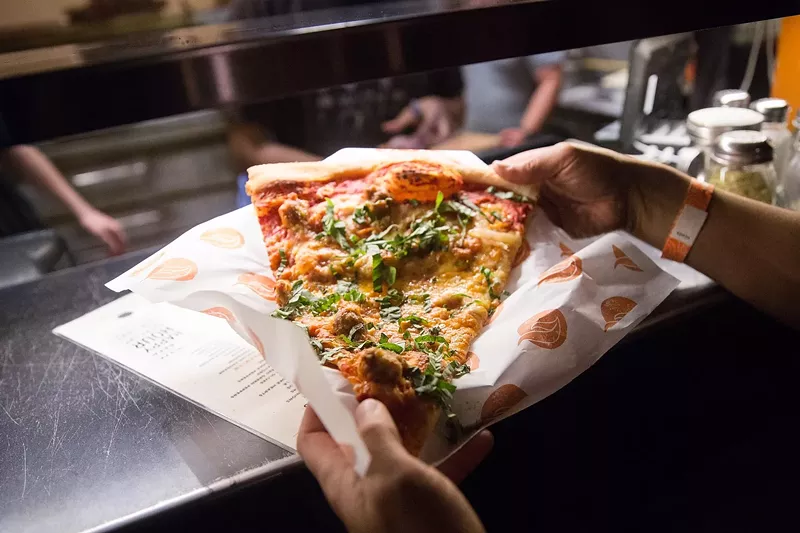 Image: Fat Sully's specializes in big New York-style slices and whole pies.