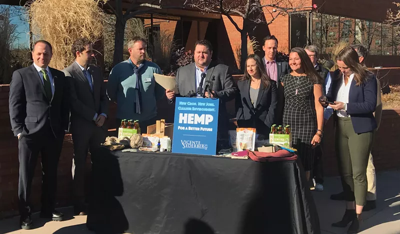 Image: Vicente Sederberg's Mason Tvert (middle) gathered members of the Colorado General Assembly and hemp industry to celebrate industrial hemp's impending federal legalization.