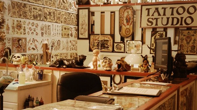 the front desk of a tattoo studio