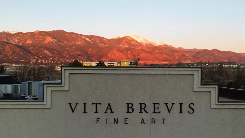 Image: Sunset behind a building