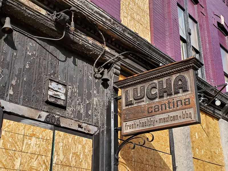 Image: Fire destroyed the dining room of Lucha Cantina but the sign remains.