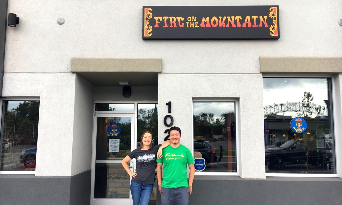 Andrea West and Craig Oberlink are excited to serve chicken wings in Washington Park West.