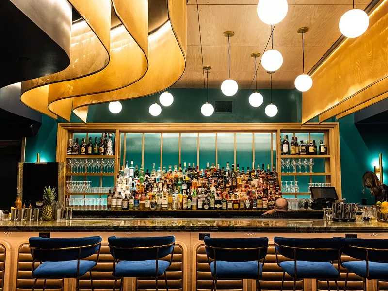 Image: Sit at the bar for a good view of the magic behind the drinks and on the stage.