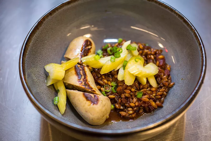 Image: Pork and oyster sausage with baked-bean-style barley.