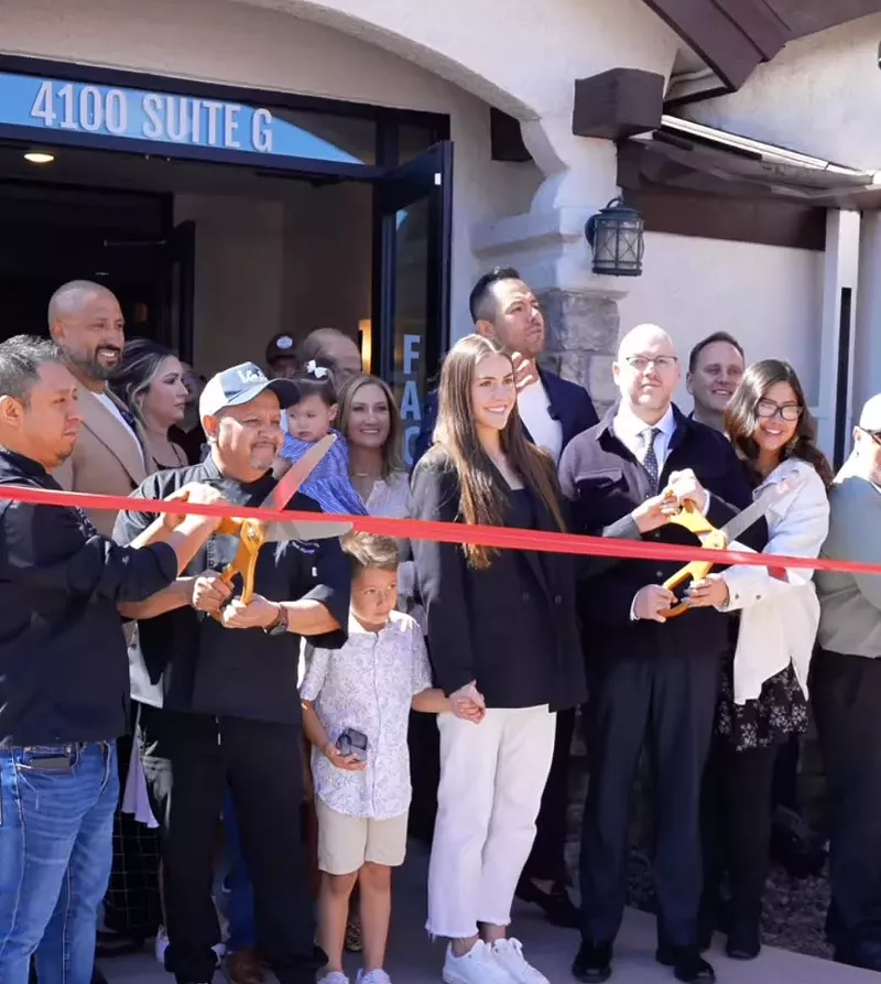 Image: ribbon cutting at restauant
