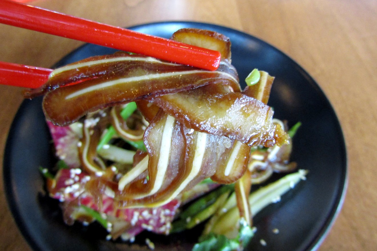 Pig-ear salad with braised tofu, watermelon radish and other veggies.