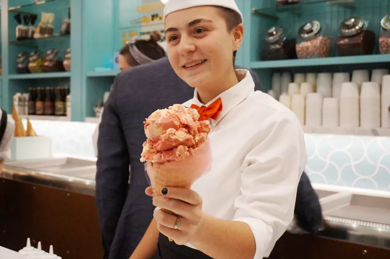 Image: A big scoop in a cotton-candy cone.