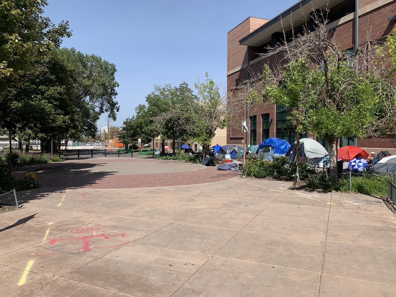 The plaza between Sonny Lawson Park and the Blair-Caldwell African American Research Library.