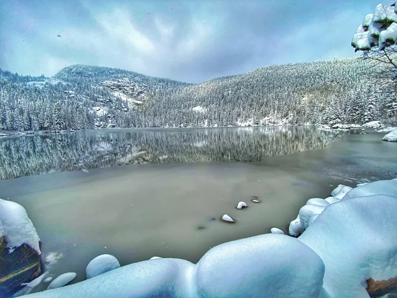 Image: landscape shot of a lake covered in ice