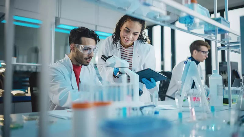 Image: people in lab coats.