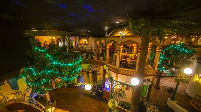 interior of a restaurant made to look like a street in mexico