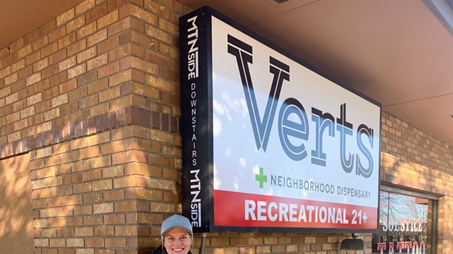 Verts Neighborhood Dispensary co-owner Ashley Close in front of her Fort Collins store.