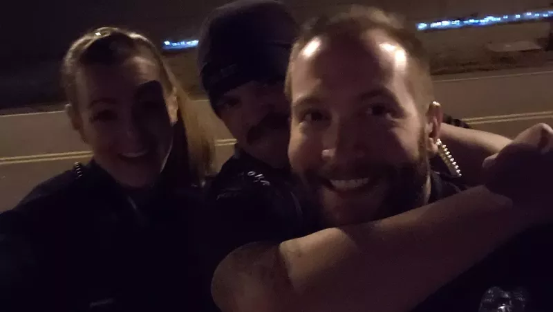 Image: The three officers who took this selfie October 20 are now off the force.