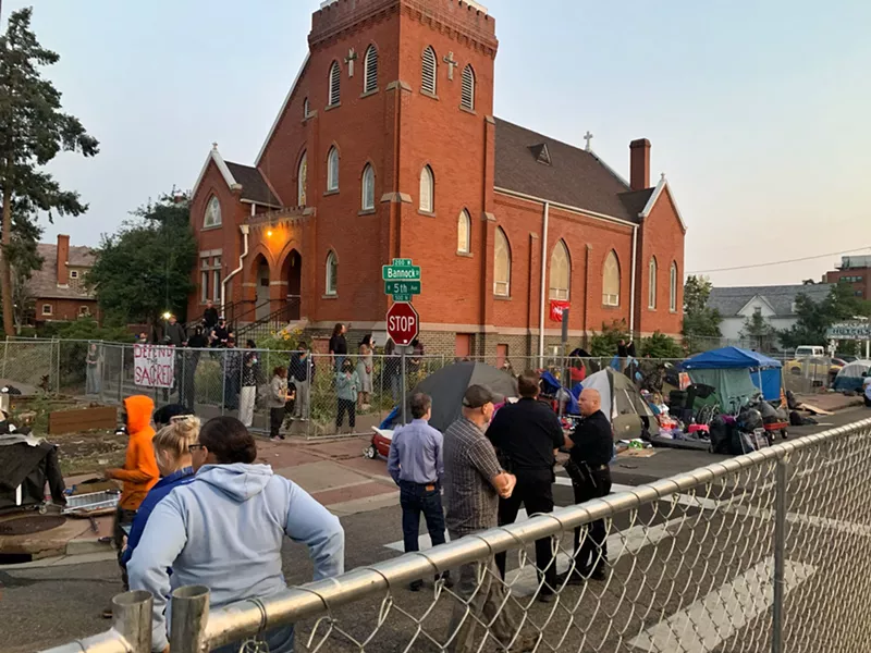 Image: Denver authorities swept a homeless encampment outside Four Winds American Indian Council on August 31.