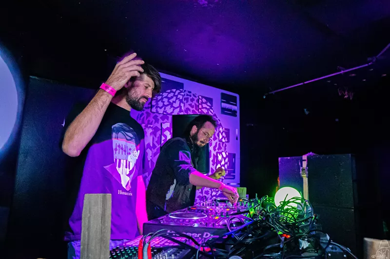 Image: DJs spinning at the decks
