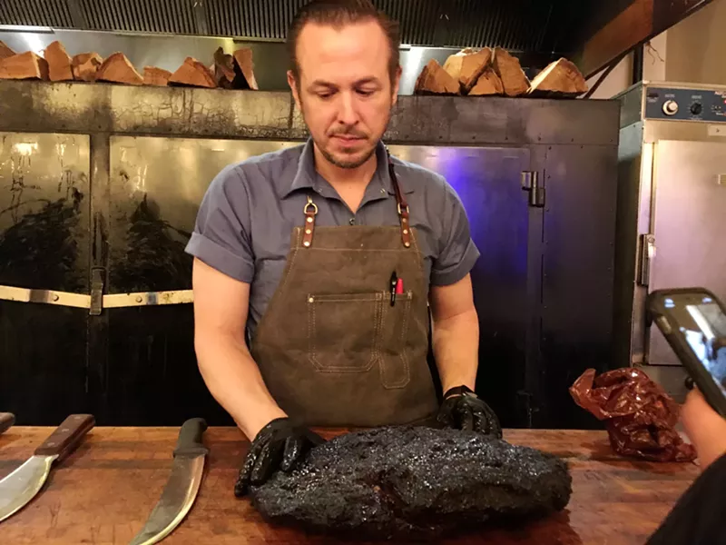Image: man with a brisket