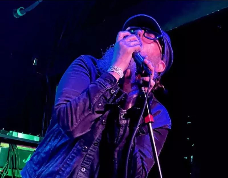 Image: Luke Fairchild singing into a microphone