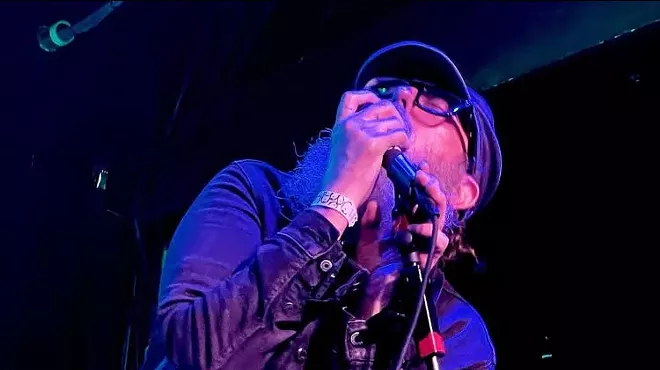 Luke Fairchild singing into a microphone