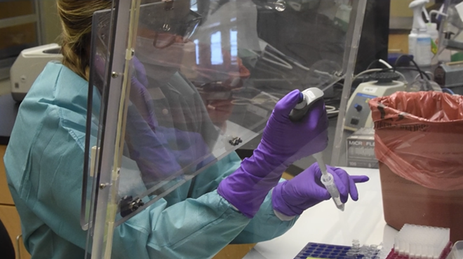 Crime lab scientist