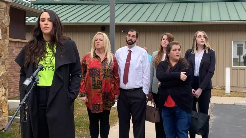 Image: Attorney Sarah Schielke, left, and members of Michael Clark's family spoke to the press prior to the December 9 hearing.