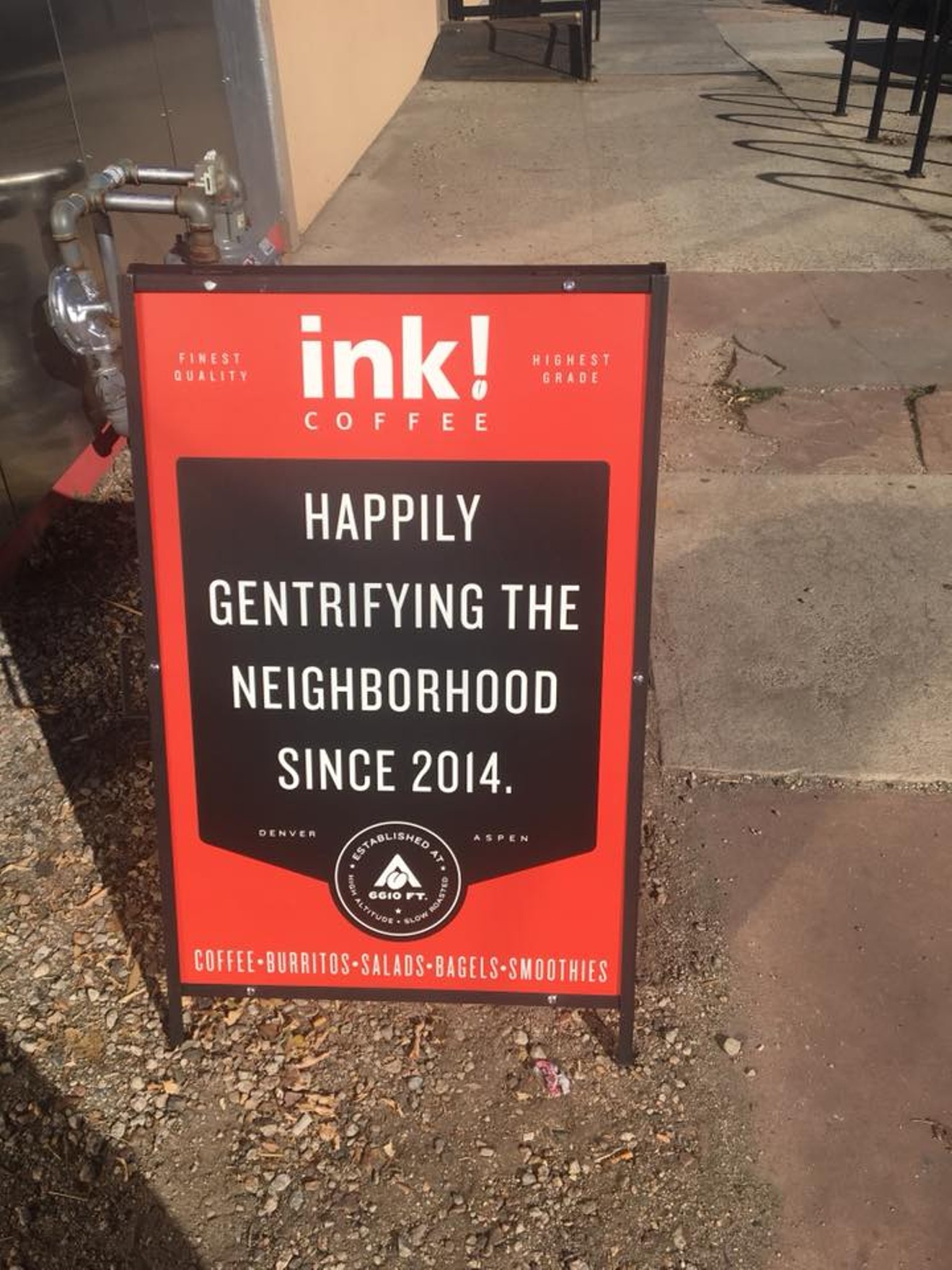RiNo residents aren't so happy about this sign at Ink! Coffee.