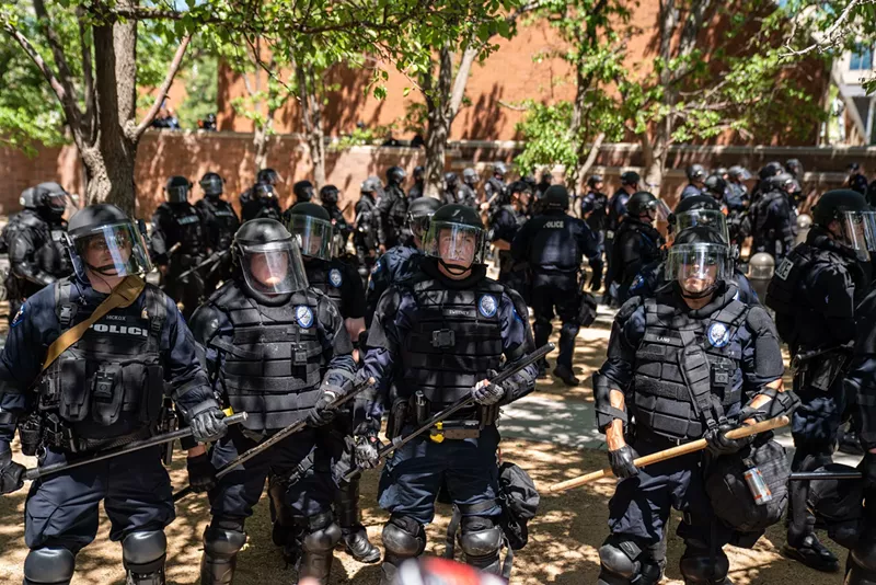 Image: Aurora officers in riot gear at a June 27 protest over the death of Elijah McClain.