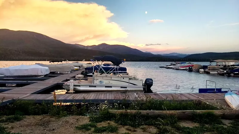 Image: Sunset at a Lake Granby boat dock.