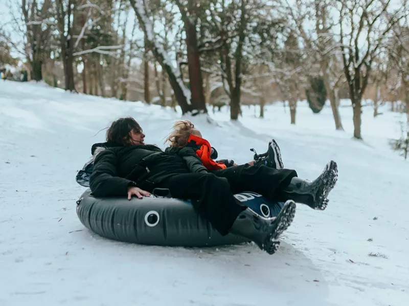 Image: It’s all smiles coming down these Colorado tubing hills.